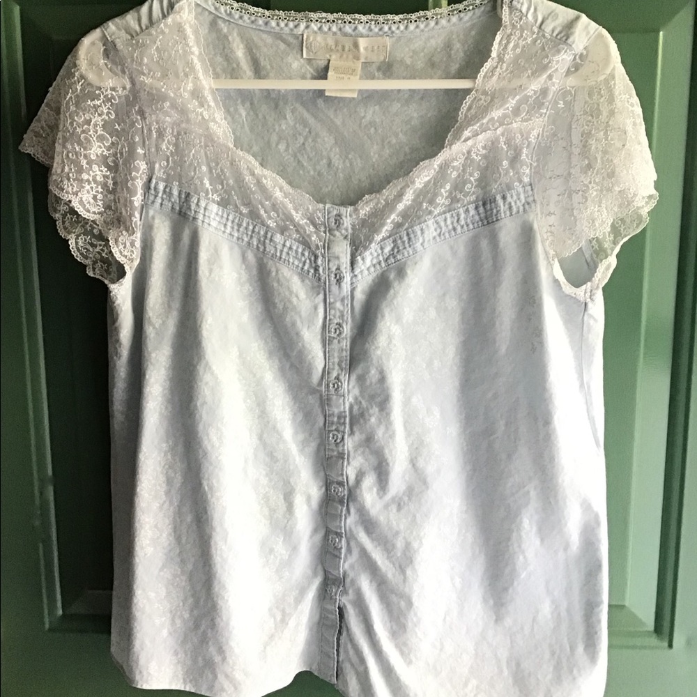 Pajama top with lace on the arms and collar.